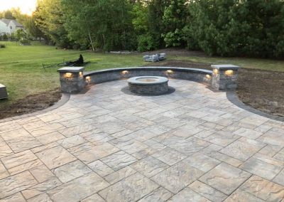 firepit and hardscape patio with lights